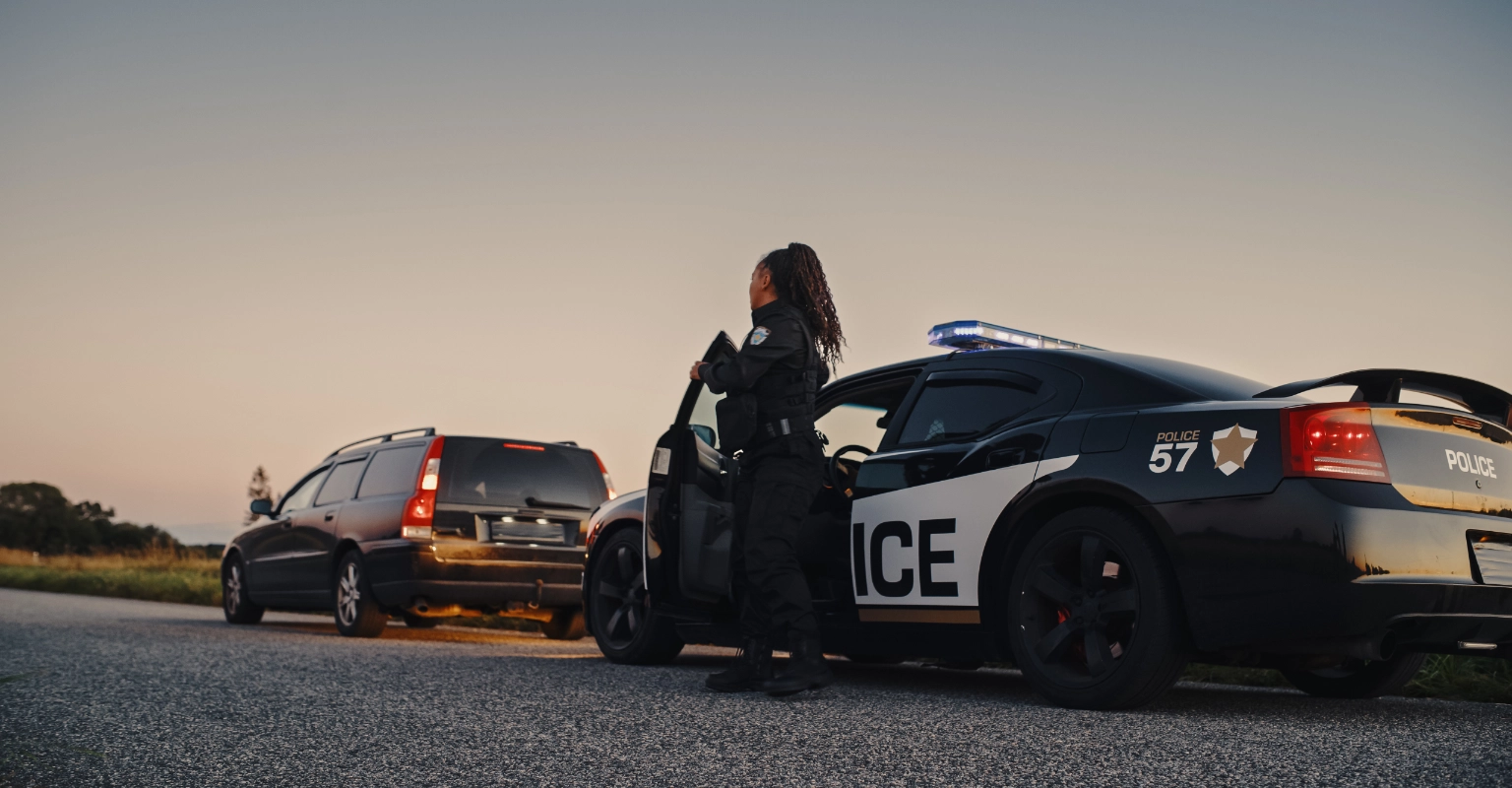 Police officer conducting a roadside traffic stop