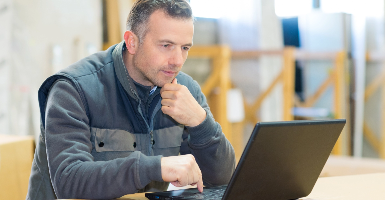 Workplace professional reviewing a testing program on a computer